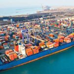 Cargo ships and financial charts symbolising global slowdown risks for India